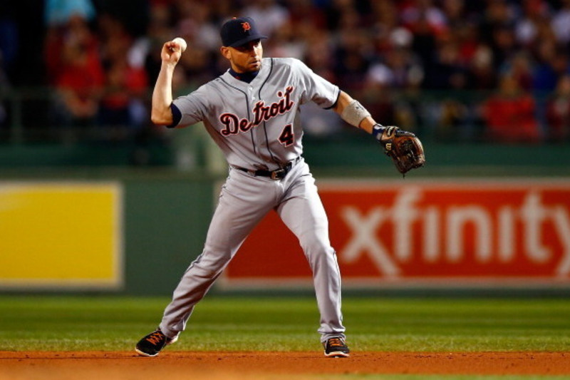 Brandon Phillips (4) throws to first base during the game between