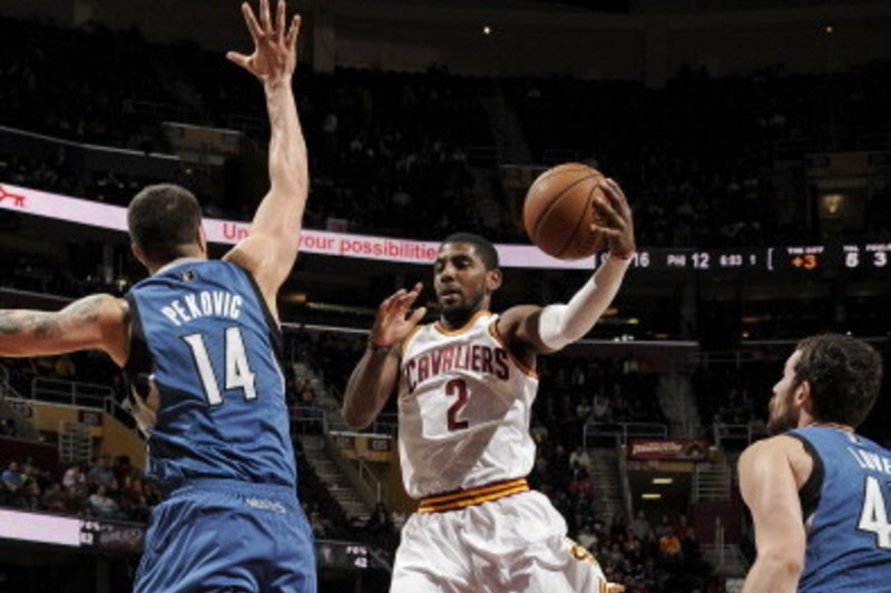 Cavaliers guard Kyrie Irving takes BP, throws out first pitch at