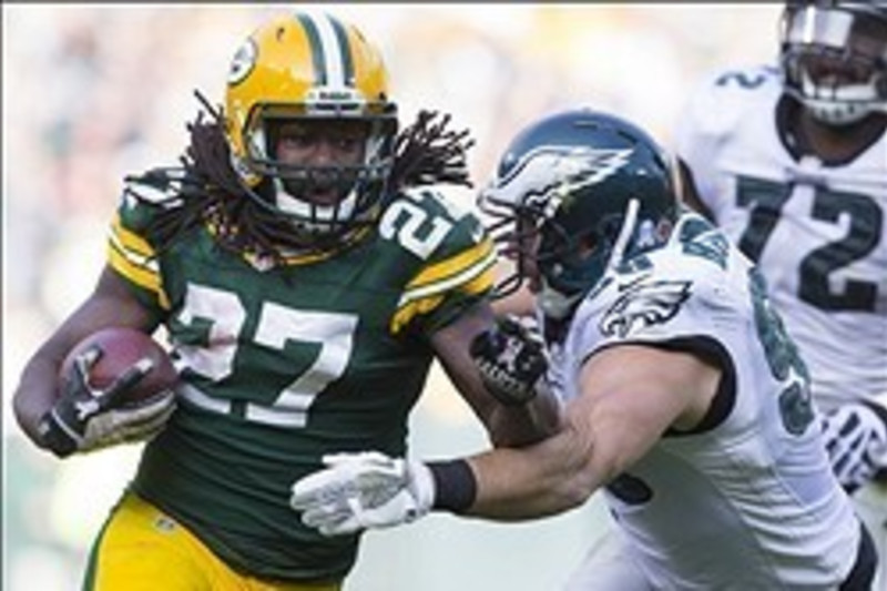 Green Bay Packers center Evan Dietrich-Smith (62) provides pass protection  for quarterback Aaron Rodgers during the second quarter of their game  against the Tennessee Titans at Lambeau Field on Sunday, December 23