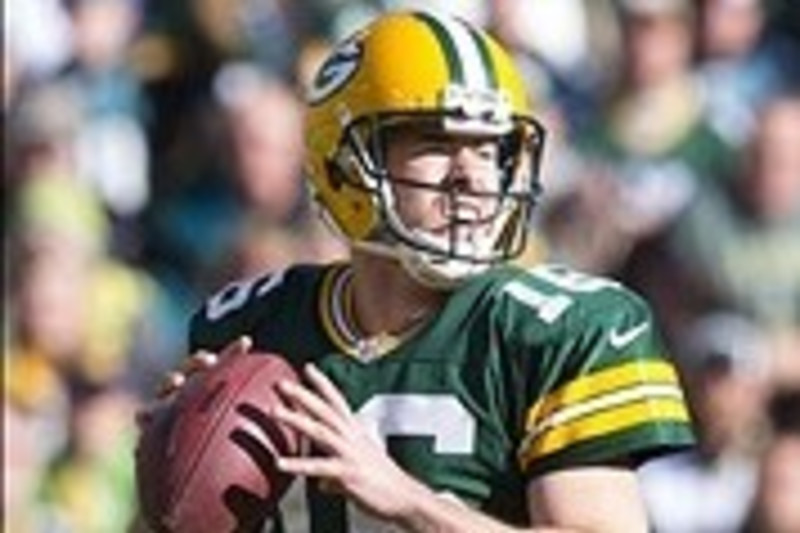 Green Bay Packers center Evan Dietrich-Smith (62) provides pass protection  for quarterback Aaron Rodgers during the second quarter of their game  against the Tennessee Titans at Lambeau Field on Sunday, December 23