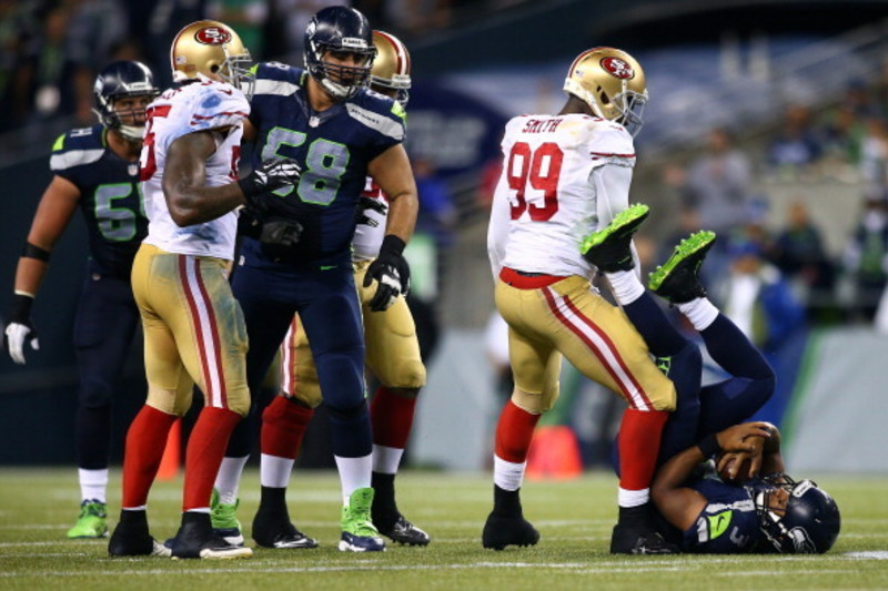 San Francisco 49ers linebacker Aldon Smith (99) against the St. Louis Rams  in an NFL football game in San Francisco, Sunday, Dec. 4, 2011. (AP  Photo/Paul Sakuma Stock Photo - Alamy