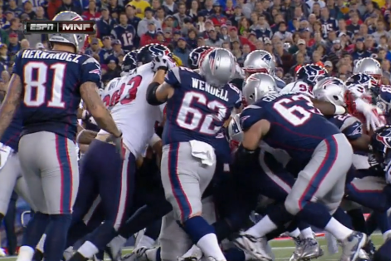 New England Patriots quarterback Tom Brady (12) points his finger in the  air after a three-yard touchdown run by running back Stevan Ridley (not  picuted) in the third quarter against the Indianapolis