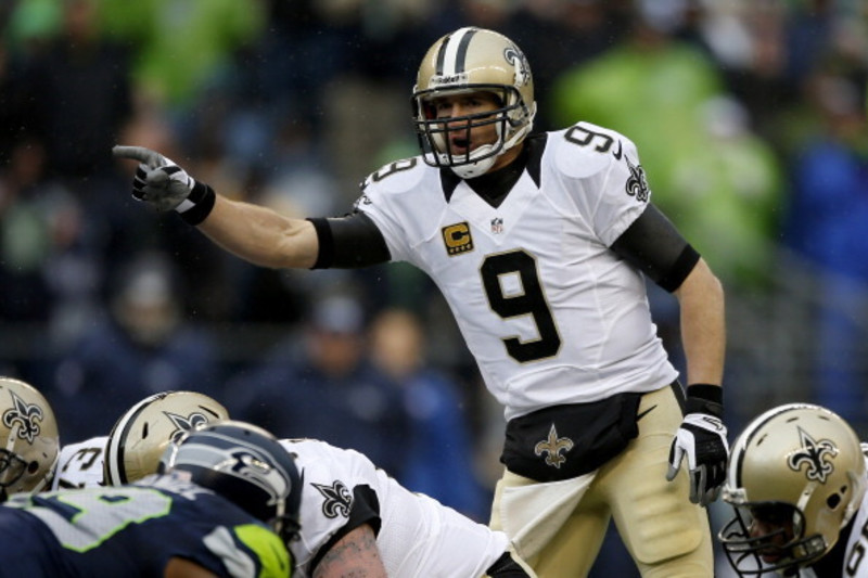 New Orleans Saints Drew Brees is seen in action in the first half of an NFL  NFC wild card playoff football game against the Seattle Seahawks, Saturday,  Jan. 8, 2011, in Seattle. (