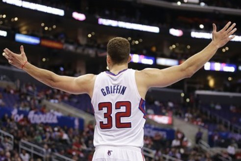 Blake Griffin elevates for a jumper in red Clipper jersey