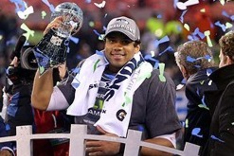 A group of Seattle Seahawks fans celebrate the win following the Super Bowl  XLVIII at MetLife Stadium in East Rutherford, New Jersey on February 2,  2014. The Seattle Seahawks whipped the Denver