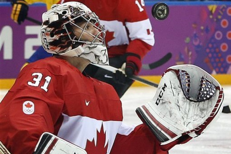 Canada defends Olympic ice hockey gold with 3-0 win over Sweden