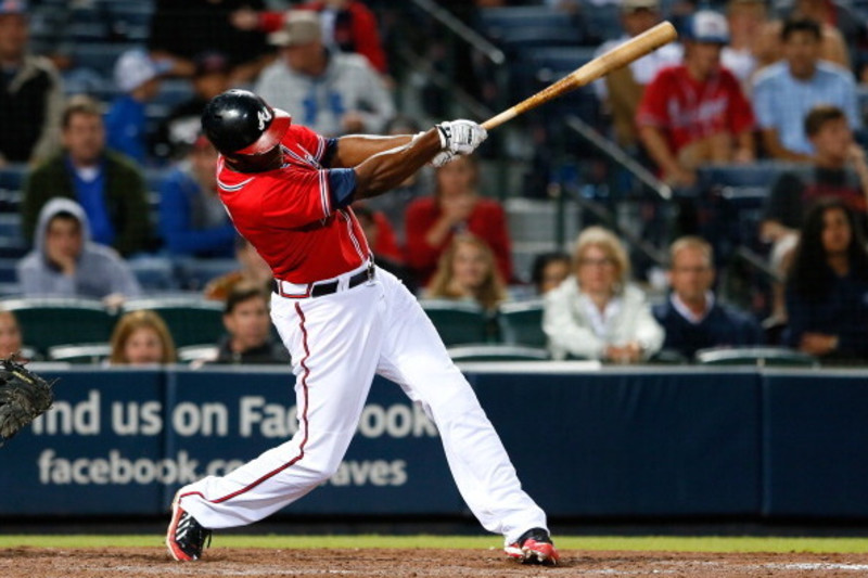 Justin Upton #8 of the Atlanta Braves hits a walk-off homer against the Washington  Nationals at Turner Field.