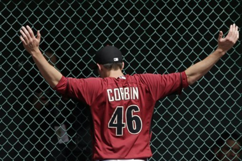 Foul ball hit off D-backs starter Patrick Corbin cracks fish tank in Miami