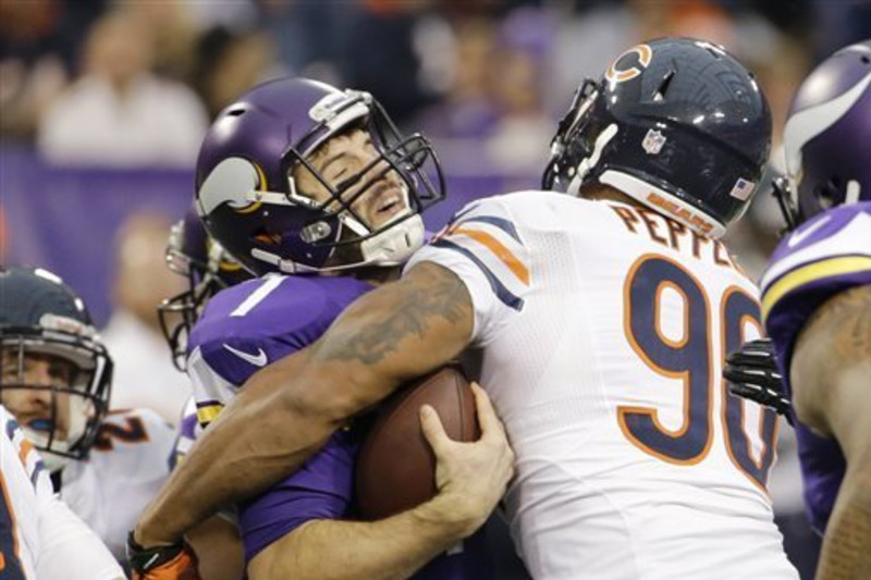 Bears release Julius Peppers after signing Lamarr Houston