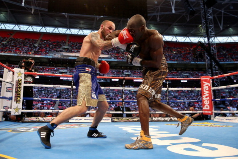 Kevin Mitchell celebrates defeating Ghislain Maduma in their Lightweight  bout at Wembley Stadium, London Stock Photo - Alamy