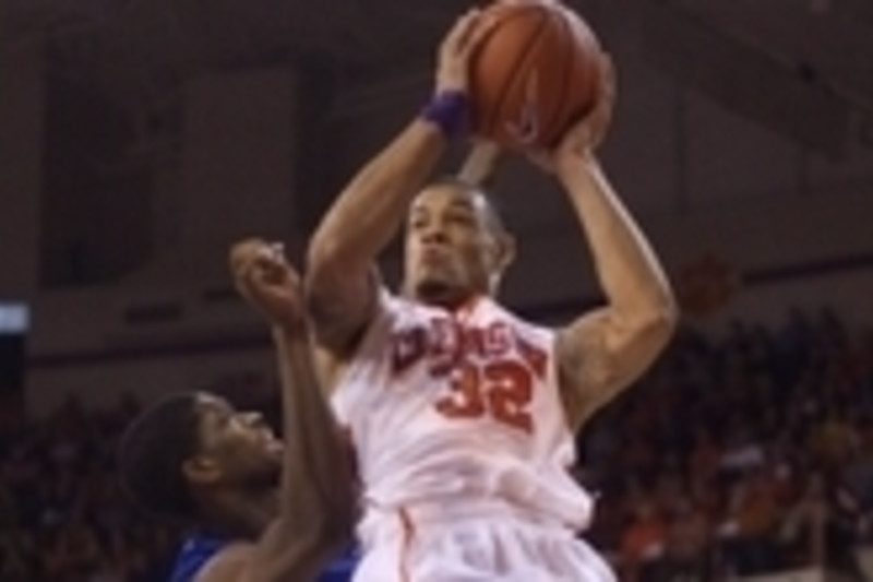 Clemson's K.J. McDaniels, left, steals a pass in the lane between