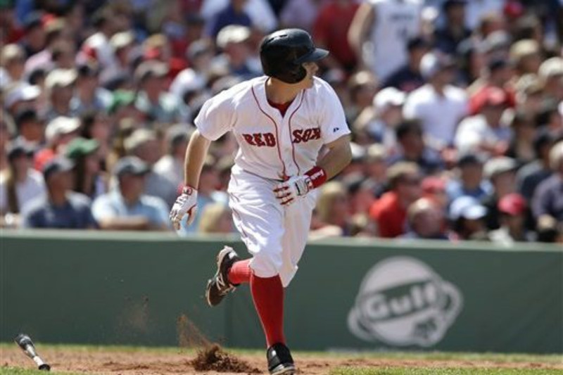 Brock Holt of the Boston Red Sox reacts to advancing to second