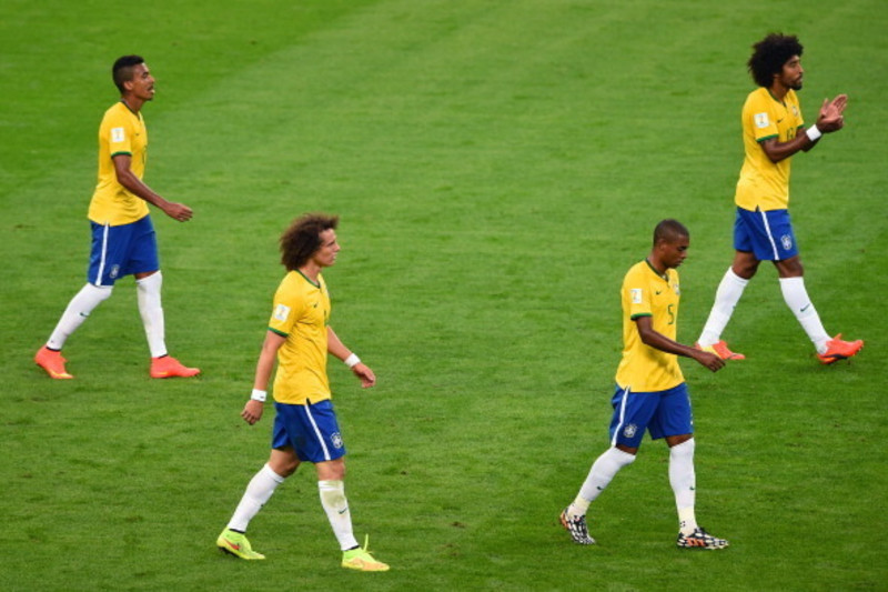 Brazil vs Germany World Cup 2014: Brazil pay tribute to the injured Neymar  by holding his shirt during the national anthem, The Independent