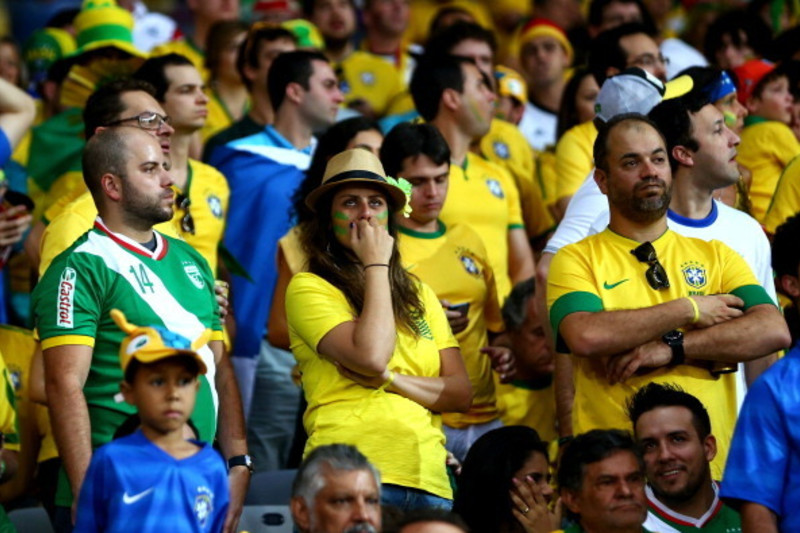 Brazil vs Germany World Cup 2014: Brazil pay tribute to the injured Neymar  by holding his shirt during the national anthem, The Independent