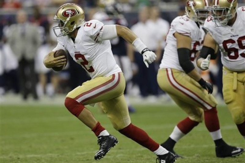 San Francisco 49ers quarterback Josh Johnson (17) hands off the ball during  an NFL football game against the Tampa Bay Buccaneers, Sunday, Dec.11,  2022, in Santa Clara, Calif. (AP Photo/Scot Tucker Stock