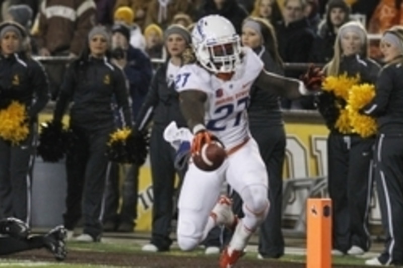 Nov 22, 2014; Laramie, WY, USA; Boise State Broncos running back Jay Ajayi (27) scores a touchdown against the Wyoming Cowboys during the first quarter at War Memorial Stadium. Mandatory Credit: Troy Babbitt-USA TODAY Sports