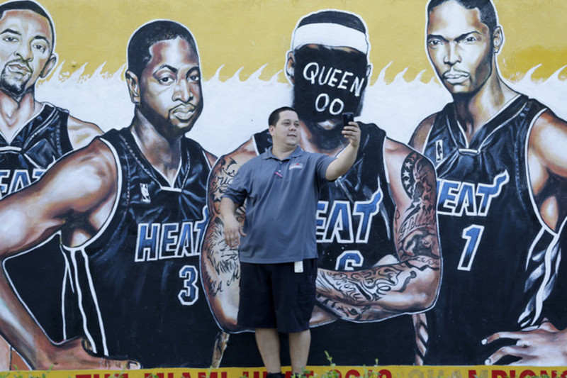 Cheers in Miami, jeers in Cleveland over LeBron