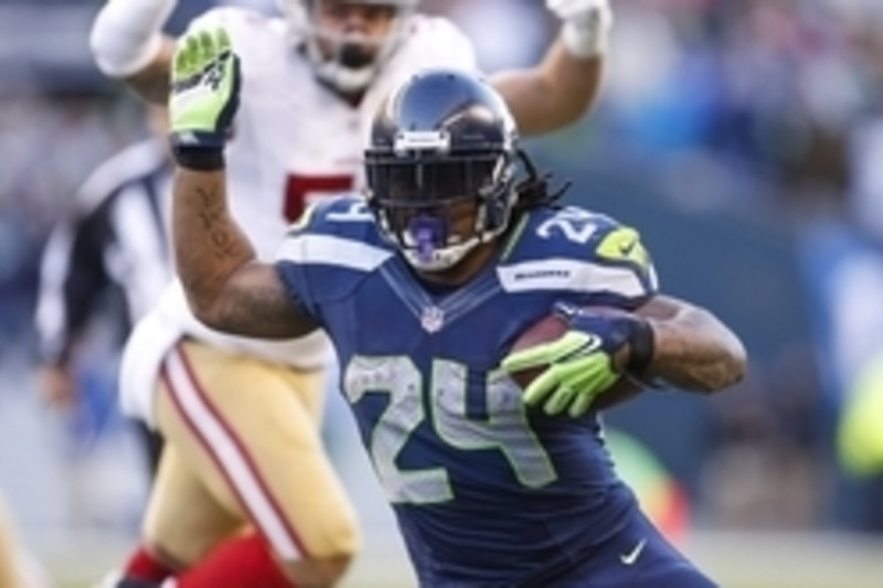 Seattle Seahawks running back Marshawn Lynch (24) runs away from