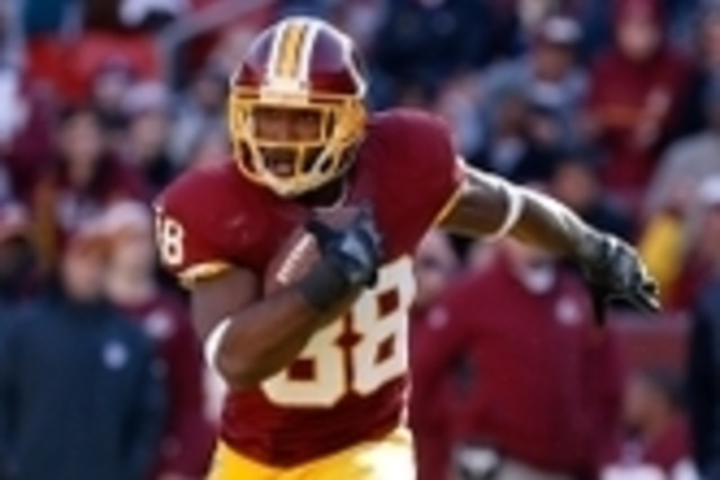 Washington Redskins Stephen Bowen celebrates with Barry Cofield