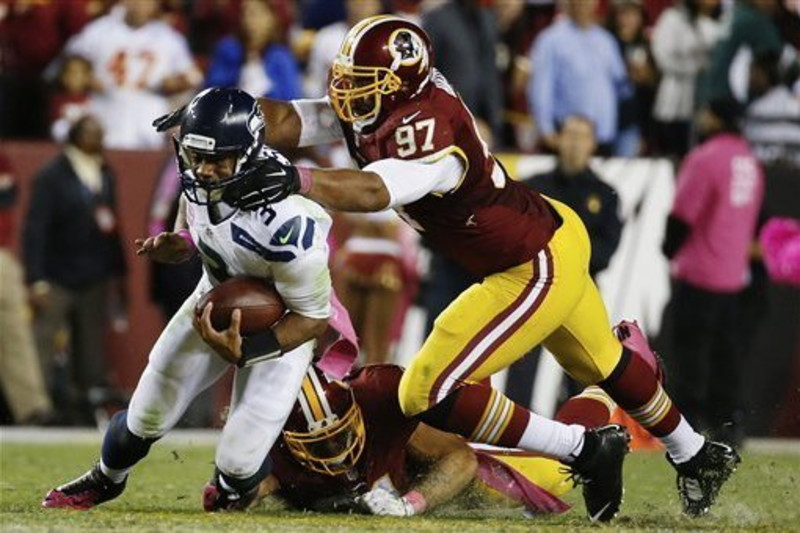 Washington Redskins defensive tackle Stephen Paea walks off the field after  the Redskins defeated the Cleveland