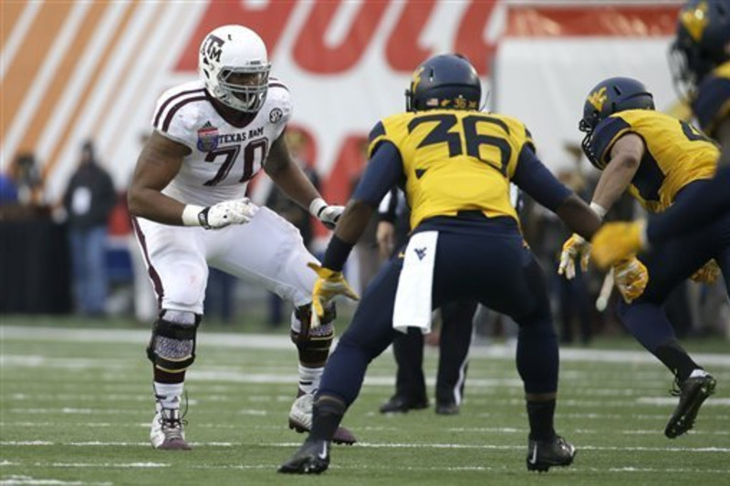 New York Jets offensive tackle Cedric Ogbuehi (70) stands at the