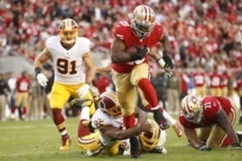 San Francisco 49ers guard Mike Iupati (77) walks off the field after being  injured during the fourth quarter of an NFL football game against the  Seattle Seahawks in Santa Clara, Calif., Thursday