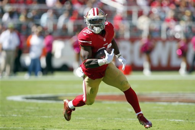 Santa Clara, California, USA. 22nd Oct, 2015. San Francisco 49ers running  back Carlos Hyde (28) stiff arms Seattle Seahawks free safety Earl Thomas  (29) on Thursday, October 22, 2015, at Levis Stadium