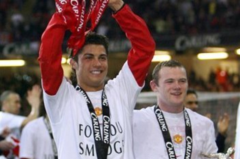 Rooney and Ronaldo celebrate the League Cup win in 2006