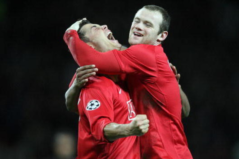 Cristiano Ronaldo and Wayne Rooney of Manchester United celebrate the 1-3  victory and …