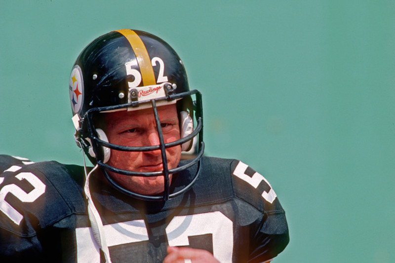 Mike Webster of the Pittsburgh Steelers sits on the sidelines