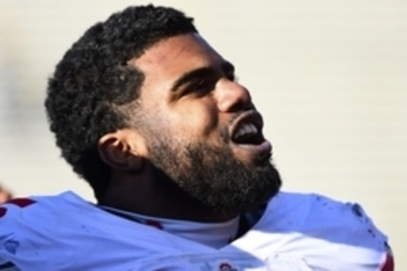 Feb. 1, 2015 - Glendale, Arizona, U.S - Ohio State Buckeyes running back Ezekiel  Elliott (15) rolls up his jersey after scoring in the second quarter of the  game between the Notre