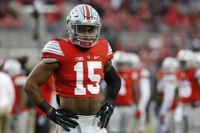 Ezekiel Elliott brings his trademark crop top look to the NFL Draft