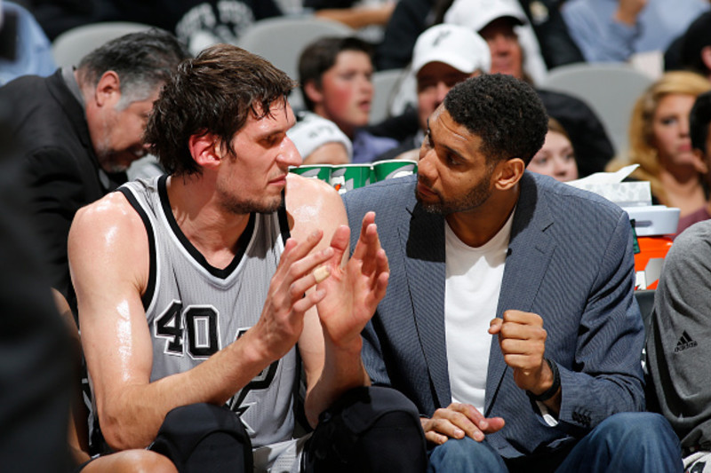 Dallas Mavericks' Boban Marjanovic shakes hands with a fan prior