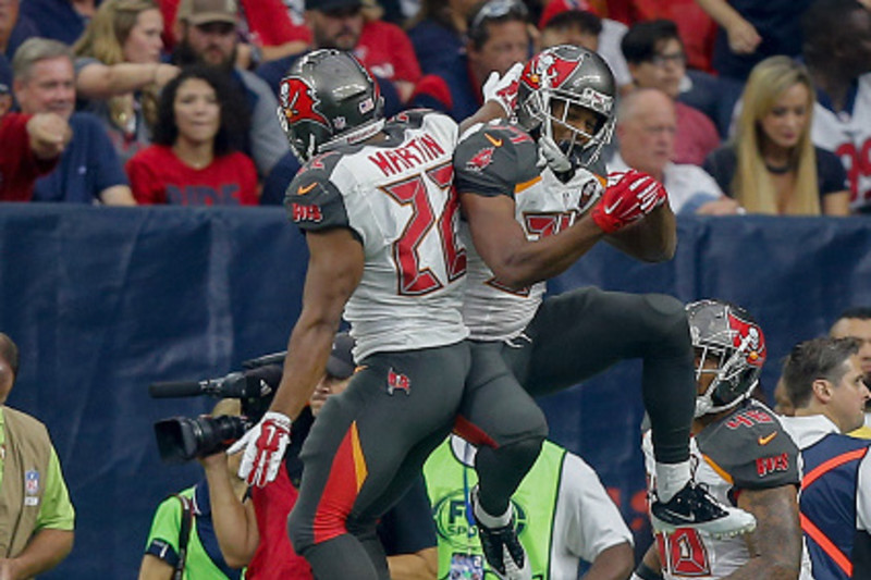 Charles Sims of the Tampa Bay Buccaneers is tackled after a run News  Photo - Getty Images