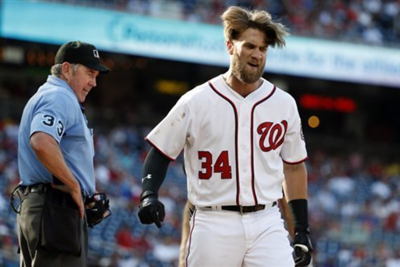 😱 Bryce Harper tosses helmet into stands after being ejected