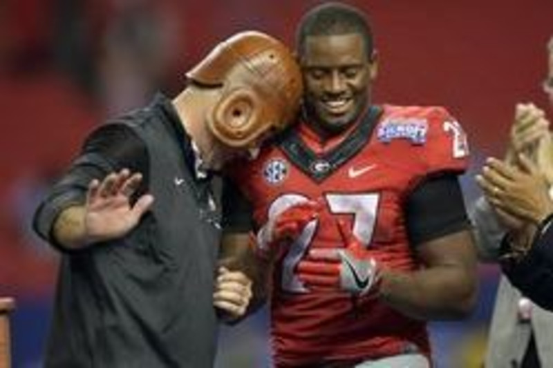 September 3, 2016: Georgia Bulldogs running back Nick Chubb (27) adorns the  victorious leather helmet along side head coach Kirby Smart following a  33-22 victory of the Chick-fil-A Kickoff Classic between the