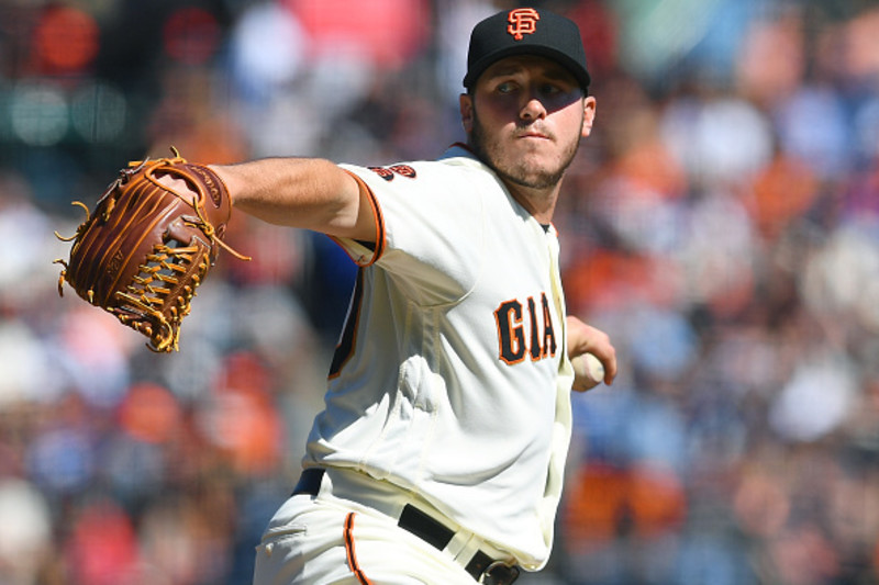 Giants rookie pitcher outduels Clayton Kershaw to clinch wild card tie