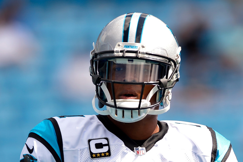 Cam Newton of the Carolina Panthers warms up before playing the