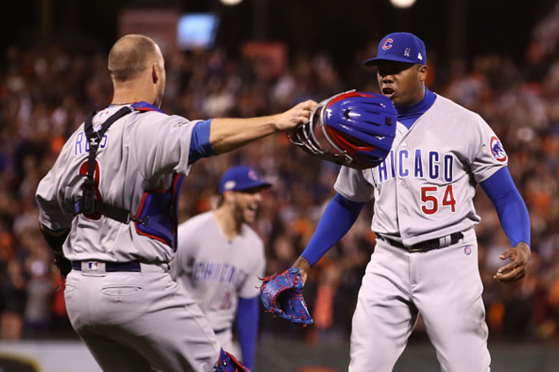 Photo: Chicago Cubs' Aroldis Chapman holds the Commissioner's