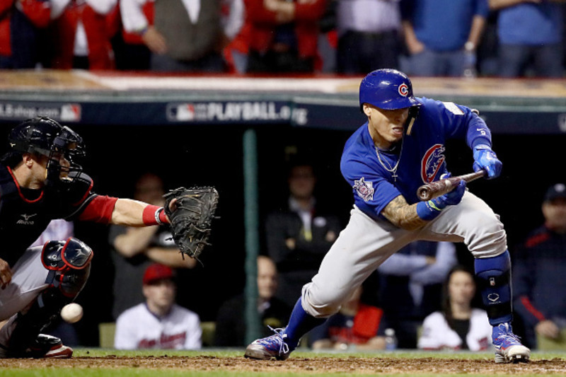 Chicago Cubs Kris Bryant falls throws to first for the final out over the  Cleveland Indians during the tenth inning of World Series game 7 at  Progressive Field in Cleveland, Ohio, on