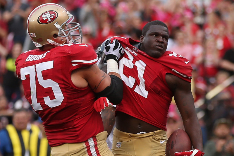 San Francisco 49ers Frank Gore (21) cuts in the backfield in the