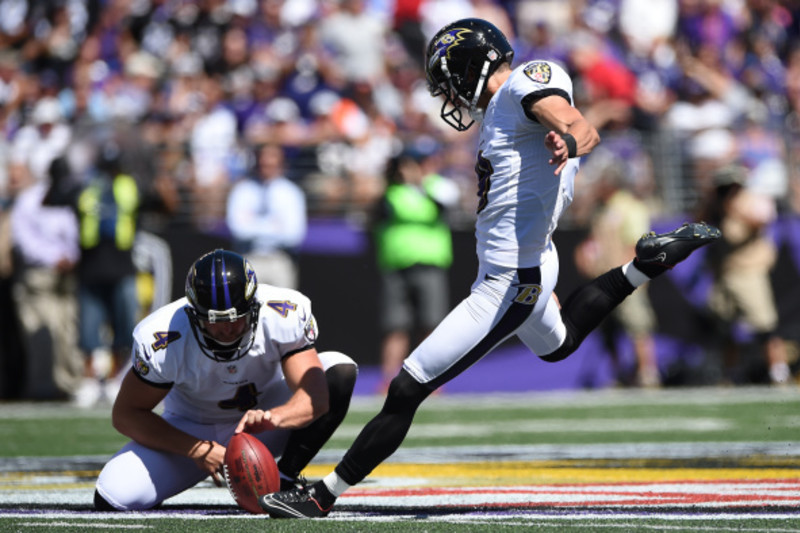 Baltimore Ravens kicker Justin Tucker (9) and Sam Koch (4) celebrate after  Tucker made a field …