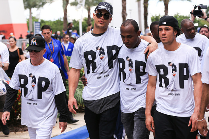 Giancarlo Stanton looks on during the funeral for Jose Fernandez