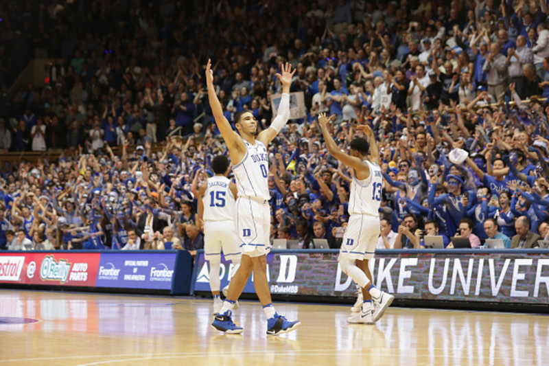 Jayson Tatum catches up with Duke University's Mike Krzyzewski