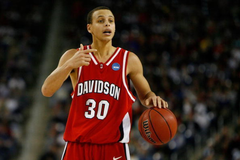 DETROIT - MARCH 30: Stephen Curry #30 of the Davidson Wildcats directs the offense against the Kansas Jayhawks during the Midwest Regional Final of the 2008 NCAA Division I Men's Basketball Tournament at Ford Field on March 30, 2008 in Detroit, Michigan.
