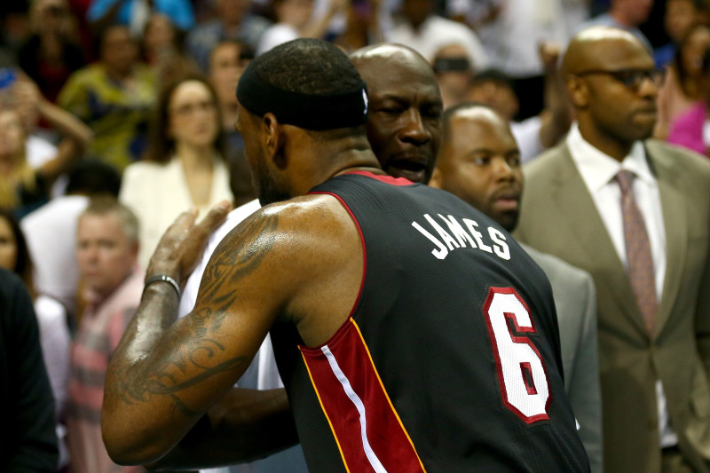 CHARLOTTE, NC - APRIL 28:  LeBron James #6 of the Miami Heat hugs Michael Jordan after defeating the Charlotte Bobcats 109-98 in Game Four of the Eastern Conference Quarterfinals during the 2014 NBA Playoffs at Time Warner Cable Arena on April 28, 2014 in