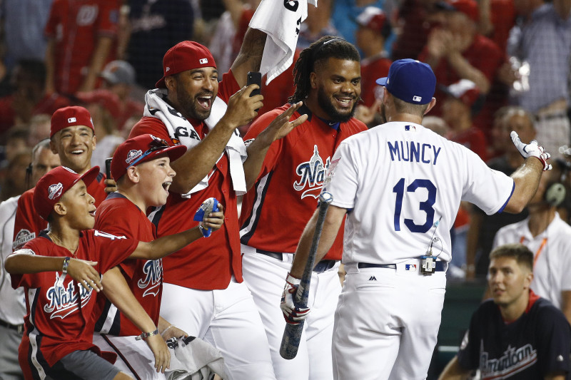 Los Angeles Dodgers second baseman Max Muncy (13) is congratulated