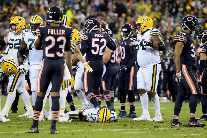 Green Bay Packers wide receiver Davante Adams (17) forces a missed tackle  by Chicago Bears defensive