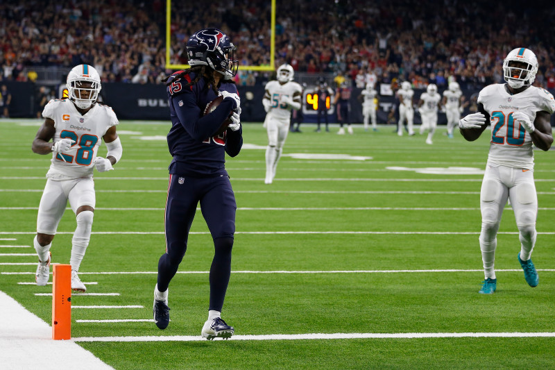 Texans' Deshaun Watson does a victory lap around Dolphins' Brock Osweiler