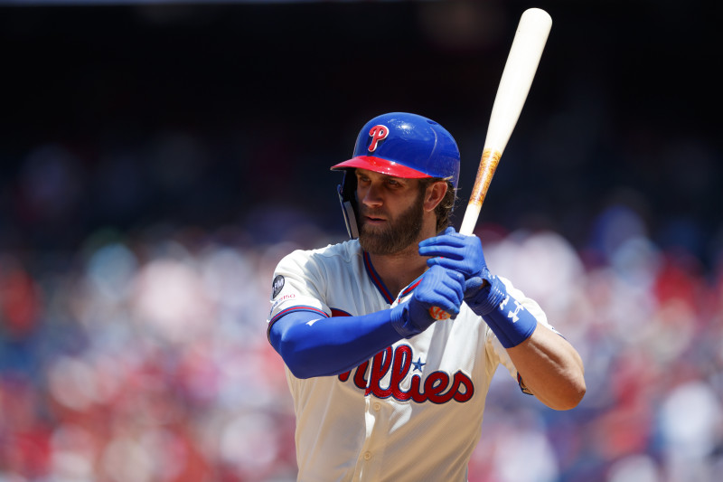 Philadelphia Phillies' Bryce Harper gets ready to throw a ball before a spring  training baseball game against the Toronto Blue Jays Saturday, March 9,  2019, in Clearwater, Fla. (AP Photo/Chris O'M …